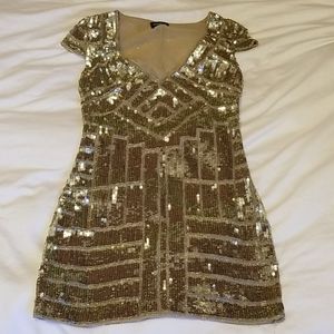 Sequined gold bebe dress